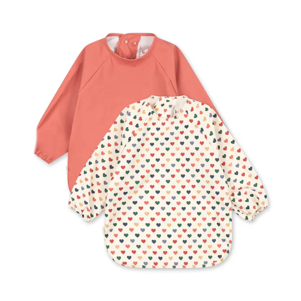 Konges Sløjd Dinner Bib With Sleeves 2pcs | Coeur Coloré/Faded Rose