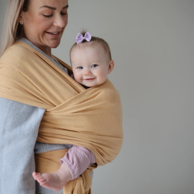 Mushie Baby Wrap sling | Mustard Melange